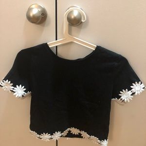 Black crop too with White flower